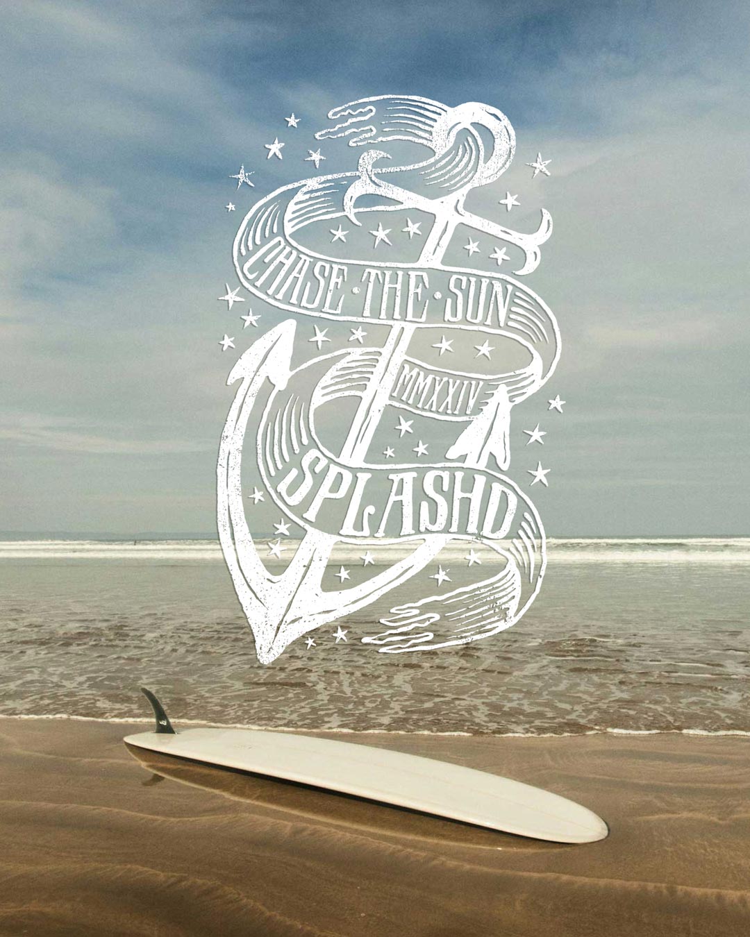 Surfboard with a white graphic design on a beach